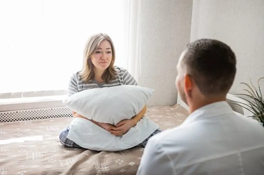 Chiropractic South Sioux City NE Woman With Pillow